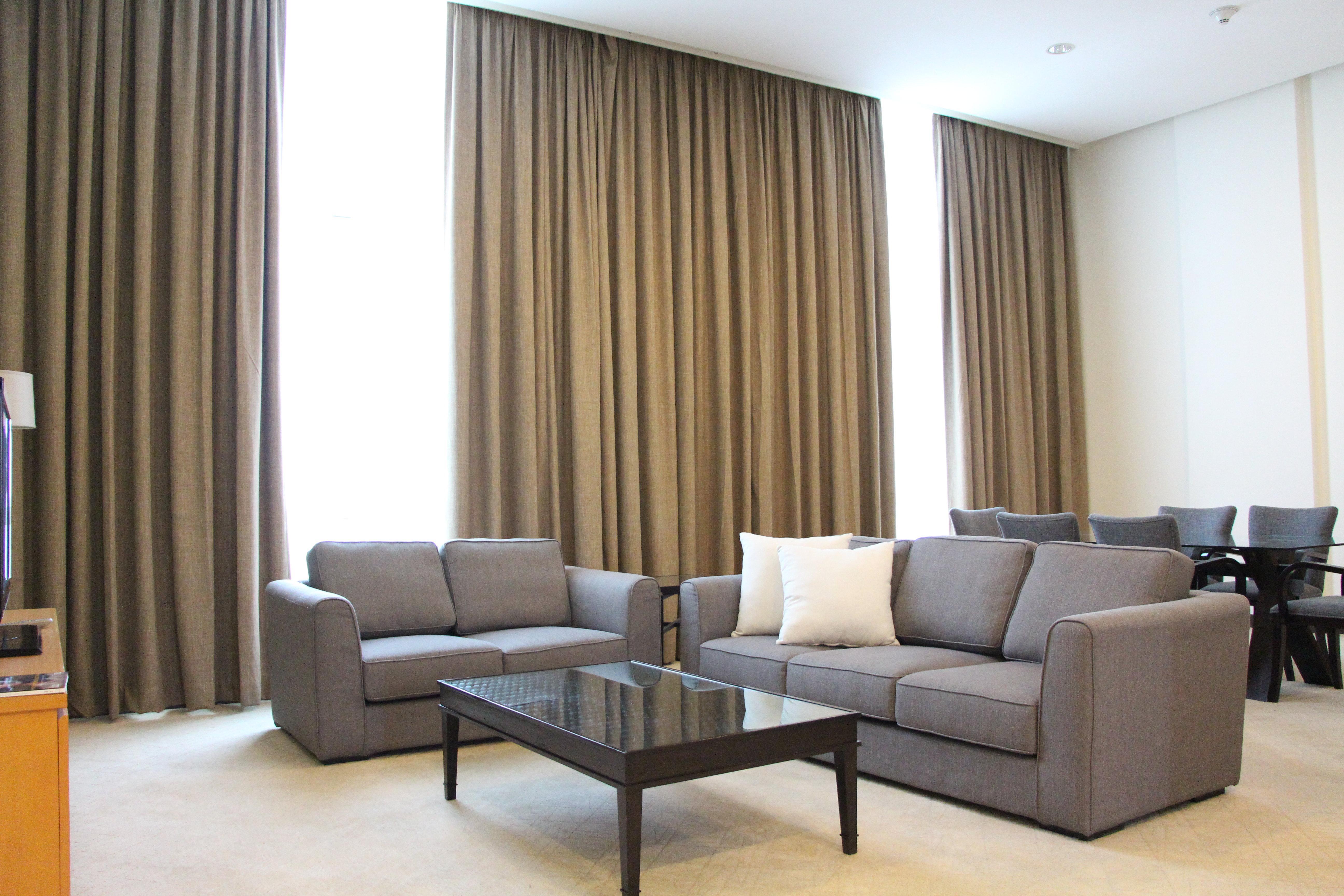 Holiday Inn Melaka By Ihg Экстерьер фото A living room with curtains